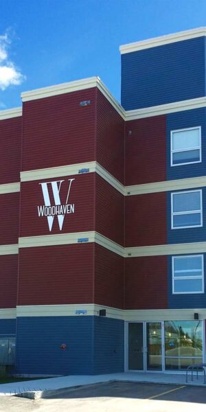 Woodhaven Condominuim front entrance and sign